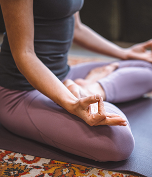 Woman in a yoga meditation pose